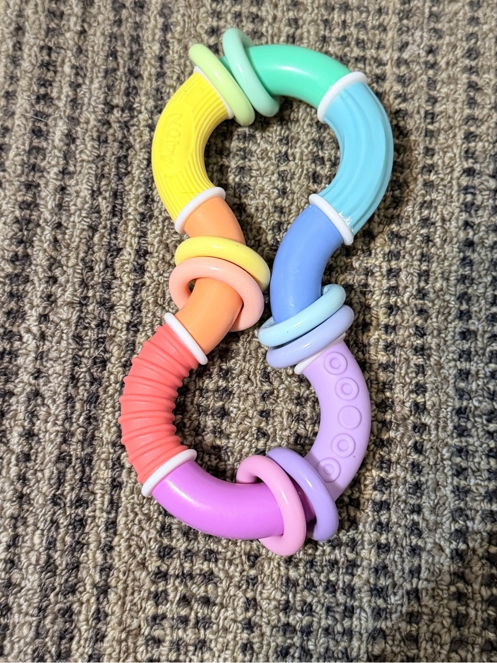 Baby Teething Ring Toy in Pastel Rainbow Colors nuby